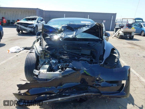 2018 Tesla Model 3 Long Range Battery z VIN 5YJ3E1EA2JF095525, wystawiony jako IAAI lot #42148713 z przebiegiem Nie podano mil oraz . Historia ofert i sprzedaży dostępna na DreamBid. Obrazek 11.