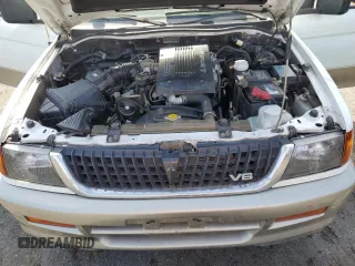 1998 Mitsubishi Montero z VIN JA4LS31P1WP029117, wystawiony jako Copart lot #72069334 z przebiegiem 172 069 mil mil oraz Szkody całkowita. Historia ofert i sprzedaży dostępna na DreamBid. Obrazek 12.