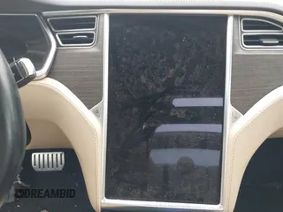 2014 Tesla Model S 60 z VIN 5YJSA1H10EFP34137, wystawiony jako IAAI lot #42311565 z przebiegiem Nie podano mil oraz . Historia ofert i sprzedaży dostępna na DreamBid. Obrazek 16.
