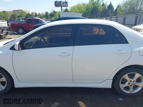 2013 Toyota Corolla L with VIN 2T1BU4EE4DC981499, listed as a IAAI auction lot 42052280 with 111,153 mi miles. Bid and sale history available at carsss.com. Image 14.