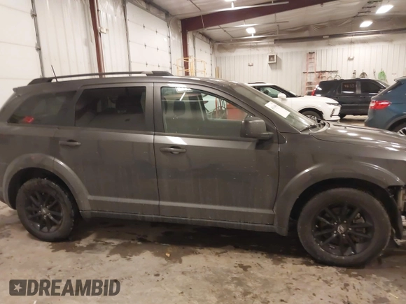 2020 Dodge Journey SE Value with VIN 3C4PDCAB7LT261279, listed as a IAAI auction lot 41564096 with 67,388 mi miles and . Bid and sale history available at DreamBid. Image 13.