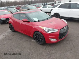 2012 Hyundai Veloster w/Gray Int z VIN KMHTC6AD6CU058468, wystawiony jako IAAI lot #41835250 z przebiegiem 43 296 mil mil oraz . Historia ofert i sprzedaży dostępna na DreamBid. Obrazek 1.