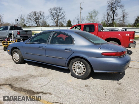 1999 Mercury Sable GS with VIN 1MEFM50U1XA653292, listed as a Copart auction lot 51307905 with 210,945 mi miles and Salvage title. Bid and sale history available at DreamBid. Image 2.