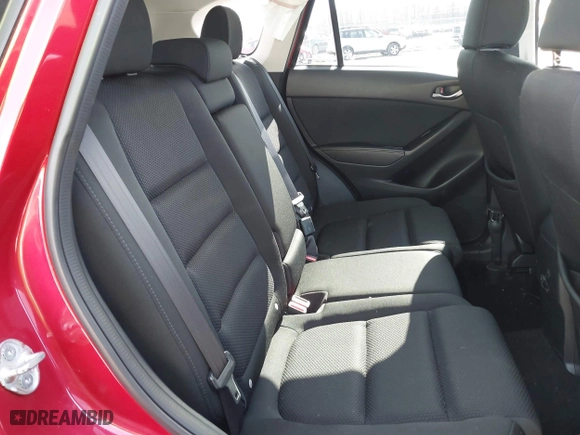 2016 Mazda CX-5 Touring with VIN JM3KE4CY5G0816285, listed as a IAAI auction lot 41888537 with 101,598 mi miles. Bid and sale history available at carsss.com. Image 8.