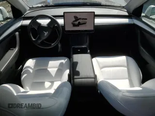 2023 Tesla Model Y Long Range with VIN 7SAYGDEE5PF691745, listed as a Copart auction lot 47784545 with 21,117 mi miles and Salvage Title. Bid and sale history available at DreamBid. Image 8.