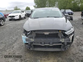 2015 Ford Fusion SE z VIN 3FA6P0H95FR206535, wystawiony jako Copart lot #54242105 z przebiegiem 83 001 mil mil oraz Szkoda całkowita • Salvage title. Historia ofert i sprzedaży dostępna na DreamBid. Obrazek 5.