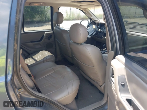 2002 Jeep Grand Cherokee Laredo with VIN 1J4GW48SX2C206755, listed as a IAAI auction lot 42631502 with 155,752 mi miles and . Bid and sale history available at DreamBid. Image 8.