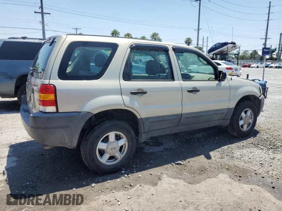 2004 Ford Escape with VIN 1FMCU02184KB21677, listed as a Copart auction lot 58401445 with 102,508 mi miles and Salvage title. Bid and sale history available at DreamBid. Image 3.