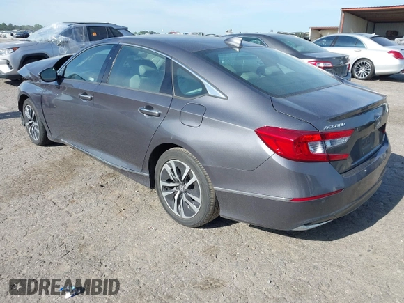 2020 Honda Accord Touring with VIN 1HGCV3F90LA013434, listed as a IAAI auction lot 42075502 with 56,645 mi miles and . Bid and sale history available at DreamBid. Image 3.