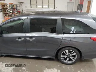 2021 Honda Odyssey Touring with VIN 5FNRL6H86MB026038, listed as a IAAI auction lot 41735249 with 68,480 mi miles. Bid and sale history available at carsss.com. Image 14.