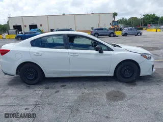 2018 Subaru Impreza with VIN 4S3GKAA68J3609404, listed as a IAAI auction lot 41954733 with 214,560 mi miles. Bid and sale history available at carsss.com. Image 13.