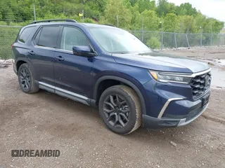 2024 Honda Pilot Touring with VIN 5FNYG1H76RB026803, listed as a IAAI auction lot 42372520 with 6,580 mi miles and . Bid and sale history available at DreamBid. Image 1.