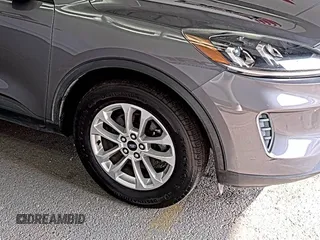 2021 Ford Escape SE with VIN 1FMCU9G6XMUA73547, listed as a IAAI auction lot 42757818 with 86,882 mi miles and . Bid and sale history available at DreamBid. Image 1.