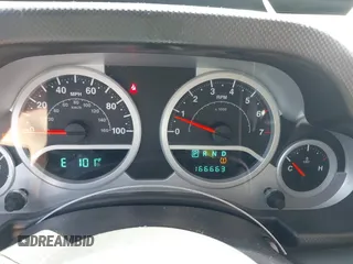 2009 Jeep Wrangler Sahara with VIN 1J4FA541X9L763737, listed as a IAAI auction lot 42721115 with 166,663 mi miles and . Bid and sale history available at DreamBid. Image 7.