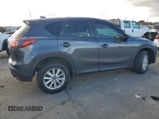 2015 Mazda CX-5 Sport with VIN JM3KE4BE0F0441203, listed as a Copart auction lot 79968514 with 134,890 mi miles and Salvage title. Bid and sale history available at DreamBid. Image 3.