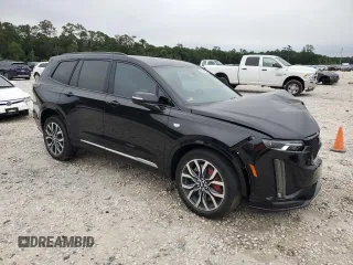 2023 Cadillac XT6 AWD Sport z VIN 1GYKPGRS6PZ126039, wystawiony jako Copart lot #55948605 z przebiegiem 39 966 mil mil oraz Szkoda całkowita • Salvage title. Historia ofert i sprzedaży dostępna na DreamBid. Obrazek 4.