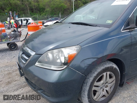2005 Honda Odyssey EX with VIN 5FNRL38495B004614, listed as a IAAI auction lot 42128185 with 230,247 mi miles. Bid and sale history available at carsss.com. Image 6.