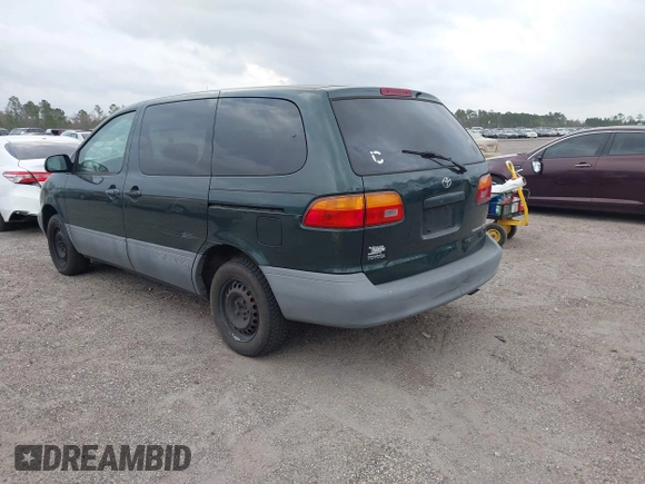 2000 Toyota Sienna CE with VIN 4T3ZF19C7YU240601, listed as a IAAI auction lot 41709617 with 999,999 mi miles. Bid and sale history available at carsss.com. Image 3.