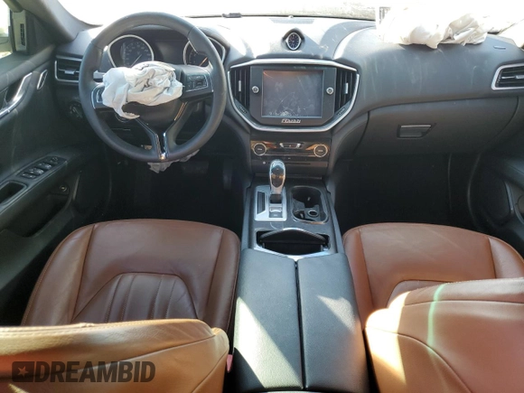 2016 Maserati Ghibli z VIN ZAM57XSAXG1167773, wystawiony jako Copart lot #46607705 z przebiegiem 62 421 mil mil oraz Szkoda całkowita • Salvage title. Historia ofert i sprzedaży dostępna na DreamBid. Obrazek 8.