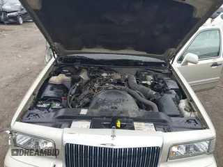 1997 Lincoln Town Car Signature z VIN 1LNLM82W8VY759792, wystawiony jako IAAI lot #41730026 z przebiegiem 60 198 mil mil oraz . Historia ofert i sprzedaży dostępna na DreamBid. Obrazek 10.