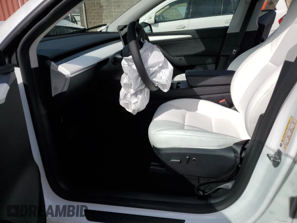 2024 Tesla Model Y Long Range с VIN 7SAYGDEE6RF149685, выставлен на аукционе Copart как лот 52986885 с пробегом Не указан миль и Списание • Salvage title. История ставок и продаж доступна на DreamBid. Изображение 7.