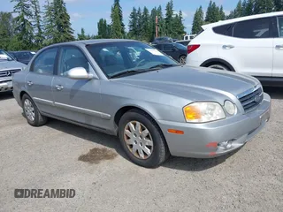 2004 Kia Optima LX z VIN KNAGD126845254748, wystawiony jako IAAI lot #42755330 z przebiegiem 158 348 mil mil oraz . Historia ofert i sprzedaży dostępna na DreamBid. Obrazek 1.