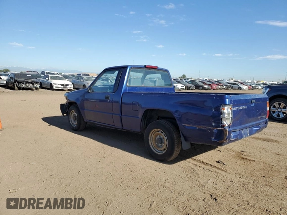 1994 Mitsubishi Mighty Max z VIN JA7LS21G4RP009588, wystawiony jako Copart lot #60519834 z przebiegiem 123 918 mil mil oraz Szkoda całkowita • Salvage title. Historia ofert i sprzedaży dostępna na DreamBid. Obrazek 2.
