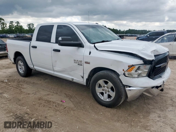 2022 Ram 1500 Tradesman with VIN 3C6RR6KT8NG187621, listed as a Copart auction lot 61386335 with 60,797 mi miles and Salvage title. Bid and sale history available at DreamBid. Image 4.