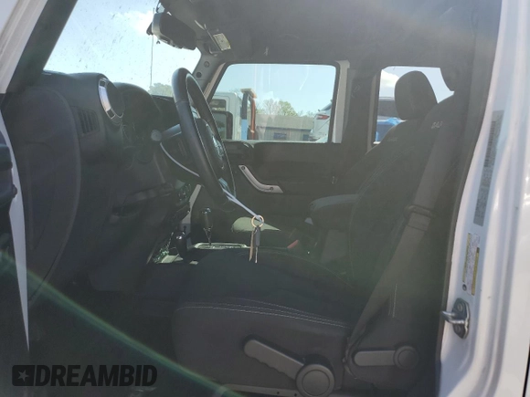 2017 Jeep Wrangler Unlimited Sahara with VIN 1C4BJWEG4HL504429, listed as a Copart auction lot 51370715 with 52,286 mi miles and Salvage Title. Bid and sale history available at carsss.com. Image 7.