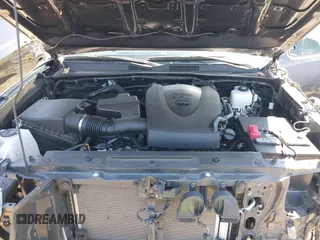 2023 Toyota Tacoma SR5 z VIN 3TMDZ5BN6PM153633, wystawiony jako IAAI lot #42353187 z przebiegiem 50 020 mil mil oraz . Historia ofert i sprzedaży dostępna na DreamBid. Obrazek 10.