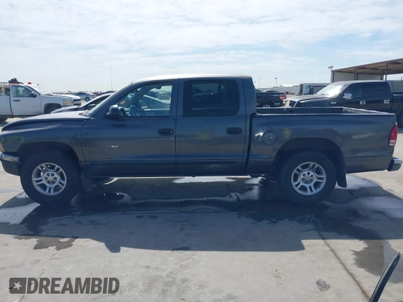 2001 Dodge Dakota z VIN 1B7HL2AX51S333575, wystawiony jako IAAI lot #41782582 z przebiegiem 291 640 mil mil oraz . Historia ofert i sprzedaży dostępna na DreamBid. Obrazek 14.