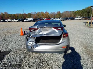 2016 Mazda Mazda3 i Sport with VIN JM1BM1U71G1315193, listed as a IAAI auction lot 41093477 with 214,069 mi miles. Bid and sale history available at carsss.com. Image 16.