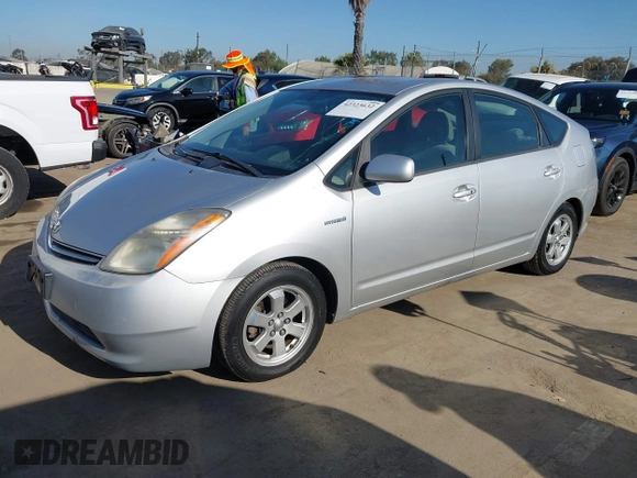 2007 Toyota Prius z VIN JTDKB20U477567380, wystawiony jako IAAI lot #42323632 z przebiegiem 193 349 mil mil oraz . Historia ofert i sprzedaży dostępna na DreamBid. Obrazek 2.