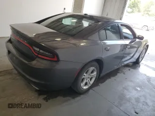 2020 Dodge Charger SXT z VIN 2C3CDXBG1LH116252, wystawiony jako Copart lot #55725565 z przebiegiem 95 039 mil mil oraz Czysty tytuł • Clean title. Historia ofert i sprzedaży dostępna na DreamBid. Obrazek 3.