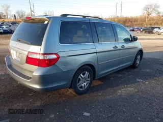 2007 Honda Odyssey EX-L z VIN 5FNRL387X7B081408, wystawiony jako IAAI lot #41143045 z przebiegiem 201 248 mil mil oraz . Historia ofert i sprzedaży dostępna na DreamBid. Obrazek 4.