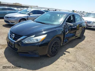2017 Nissan Altima 2.5 SR with VIN 1N4AL3AP9HC151928, listed as a IAAI auction lot 42020334 with 136,101 mi miles. Bid and sale history available at carsss.com. Image 17.
