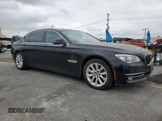 2015 BMW 7 Series 740Li with VIN WBAYE4C5XFD947497, listed as a Copart auction lot 55705975 with 257,496 mi miles and Clean Title. Bid and sale history available at DreamBid. Image 4.
