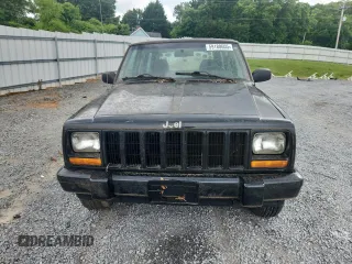 1999 Jeep Cherokee z VIN 1J4FF28P4XL560533, wystawiony jako Copart lot #59180605 z przebiegiem 190 262 mil mil oraz Czysty tytuł • Clean title. Historia ofert i sprzedaży dostępna na DreamBid. Obrazek 5.