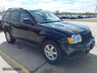 2008 Jeep Grand Cherokee Laredo with VIN 1J8HR48N58C150754, listed as a IAAI auction lot 41296808 with 212,616 mi miles. Bid and sale history available at carsss.com. Image 1.