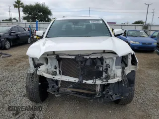 2018 Toyota Tacoma SR z VIN 3TMCZ5AN5JM181489, wystawiony jako Copart lot #55696365 z przebiegiem 70 091 mil mil oraz Szkoda całkowita • Salvage title. Historia ofert i sprzedaży dostępna na DreamBid. Obrazek 5.