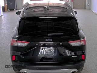 2021 Ford Escape SE with VIN 1FMCU9G60MUA42842, listed as a IAAI auction lot 42791500 with 91,398 mi miles and . Bid and sale history available at DreamBid. Image 6.