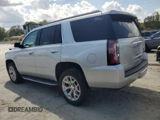 2016 GMC Yukon SLT with VIN 1GKS1BKC1GR413225, listed as a Copart auction lot 66547034 with 56,073 mi miles and Salvage Title. Bid and sale history available at carsss.com. Image 2.