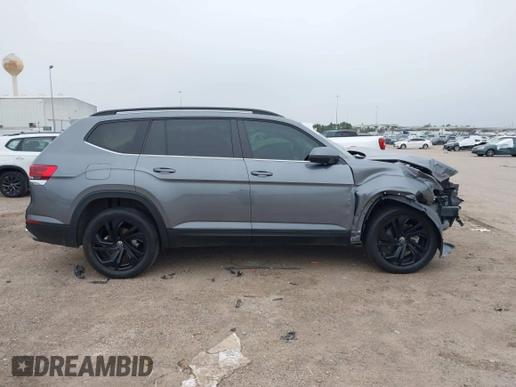 2023 Volkswagen Atlas SE with VIN 1V2WP2CA7PC549921, listed as a IAAI auction lot 41254273 with 87,540 mi miles and . Bid and sale history available at DreamBid. Image 14.