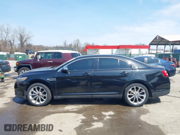 2014 Ford Taurus Limited with VIN 1FAHP2F80EG104984, listed as a IAAI auction lot 41910463 with 174,034 mi miles. Bid and sale history available at carsss.com. Image 14.