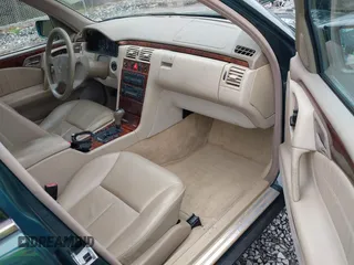 1998 Mercedes-Benz E-Class with VIN WDBJF65FXWA589630, listed as a IAAI auction lot 41990725 with 102,149 mi miles. Bid and sale history available at carsss.com. Image 5.