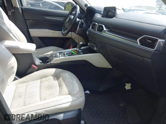 2019 Mazda CX-5 Grand Touring with VIN JM3KFBDM7K0619379, listed as a IAAI auction lot 42007107 with 209,590 mi miles. Bid and sale history available at carsss.com. Image 5.
