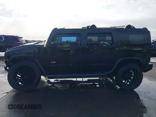 2003 Hummer H2 z VIN 5GRGN23UX3H112173, wystawiony jako IAAI lot #41093359 z przebiegiem Nie podano mil oraz . Historia ofert i sprzedaży dostępna na DreamBid. Obrazek 15.