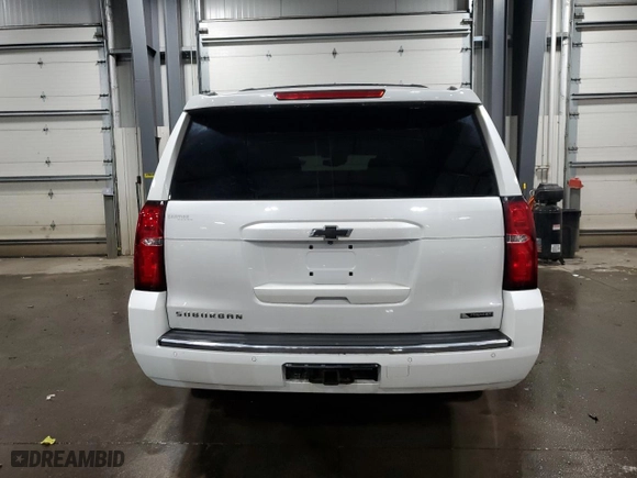 2017 Chevrolet Suburban Premier with VIN 1GNSKJKC1HR131632, listed as a Copart auction lot 49453455 with 140,325 mi miles and Salvage Title. Bid and sale history available at carsss.com. Image 6.