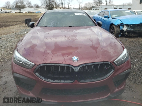 2021 BMW M8 z VIN WBSGV0C03MCF60039, wystawiony jako Copart lot #39737763 z przebiegiem Nie podano mil oraz . Historia ofert i sprzedaży dostępna na DreamBid. Obrazek 5.