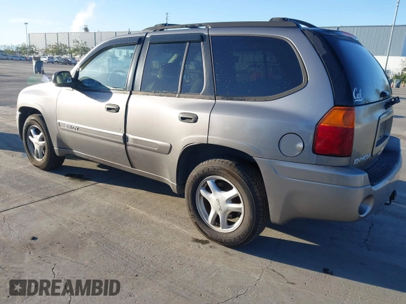 2005 GMC Envoy SLT with VIN 1GKDT13S152373799, listed as a IAAI auction lot 41537512 with 187,750 mi miles. Bid and sale history available at carsss.com. Image 3.